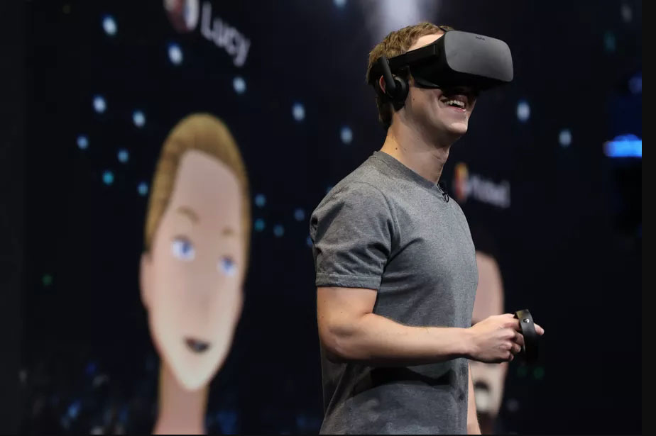 Mark Zuckerberg with a Oculus VR headset on