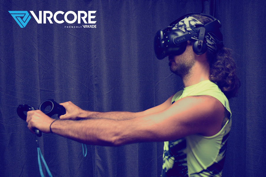 A man experiencing VRCore with an HTC Vive Headset.