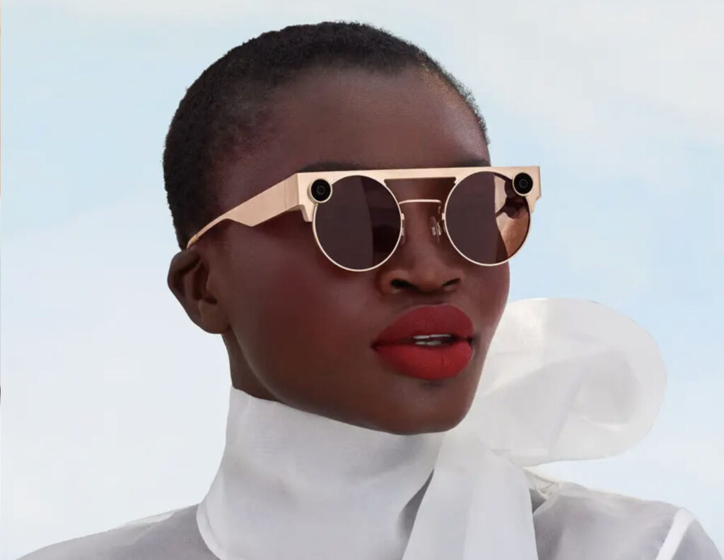 Woman wearing Snapchat generation 4 spectacles