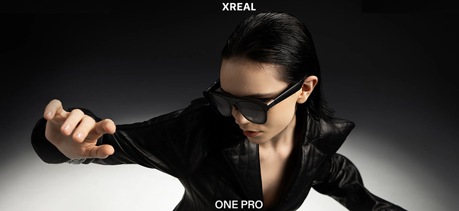 A woman wearing the Xreal One Pro AR Glasses